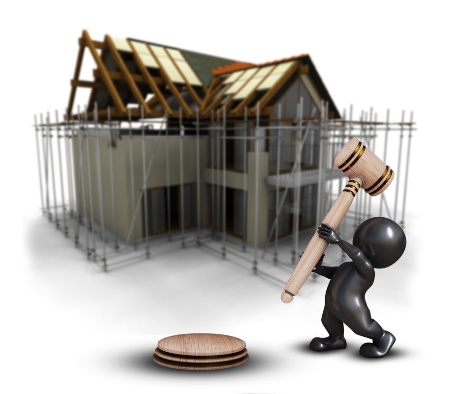 3d-morph-man-with-gavel-against-defocussed-house-construction-image