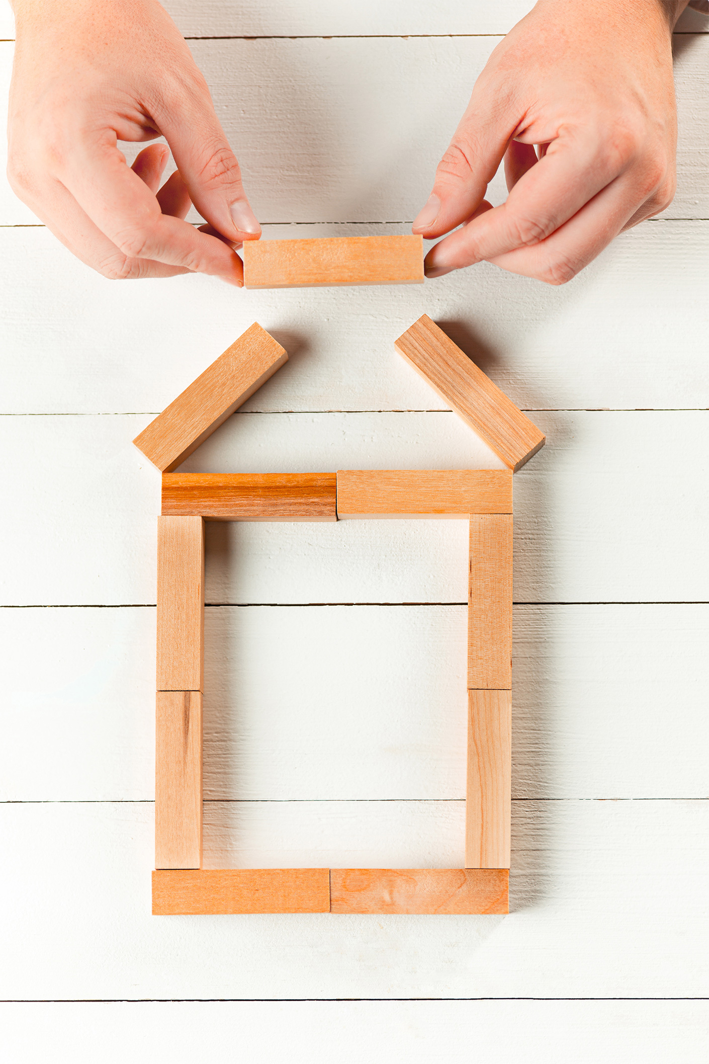 man-wooden-cubes-table-management-concept